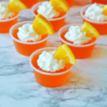Orange Creamsicle Jello Shots with whipped cream