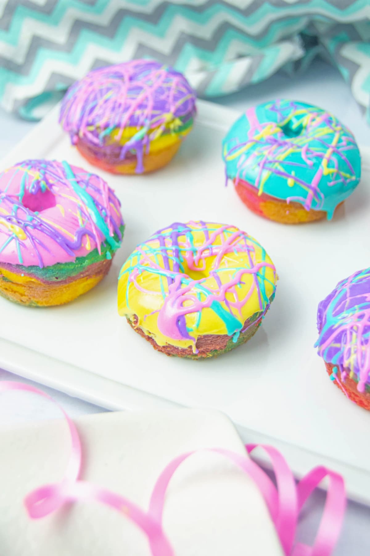 Rainbow donuts with blue and gray chevron style towel