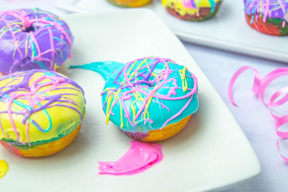 Purple, teal and yellow donuts