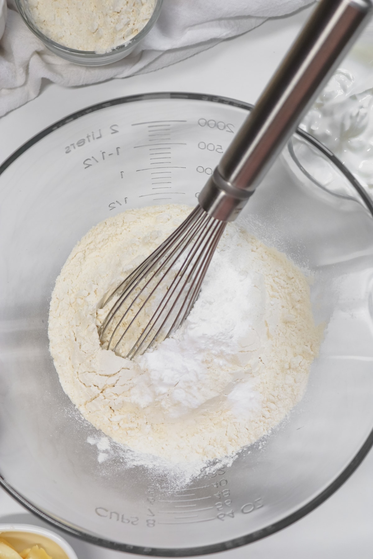 Whisking flour, baking powder and baking soda