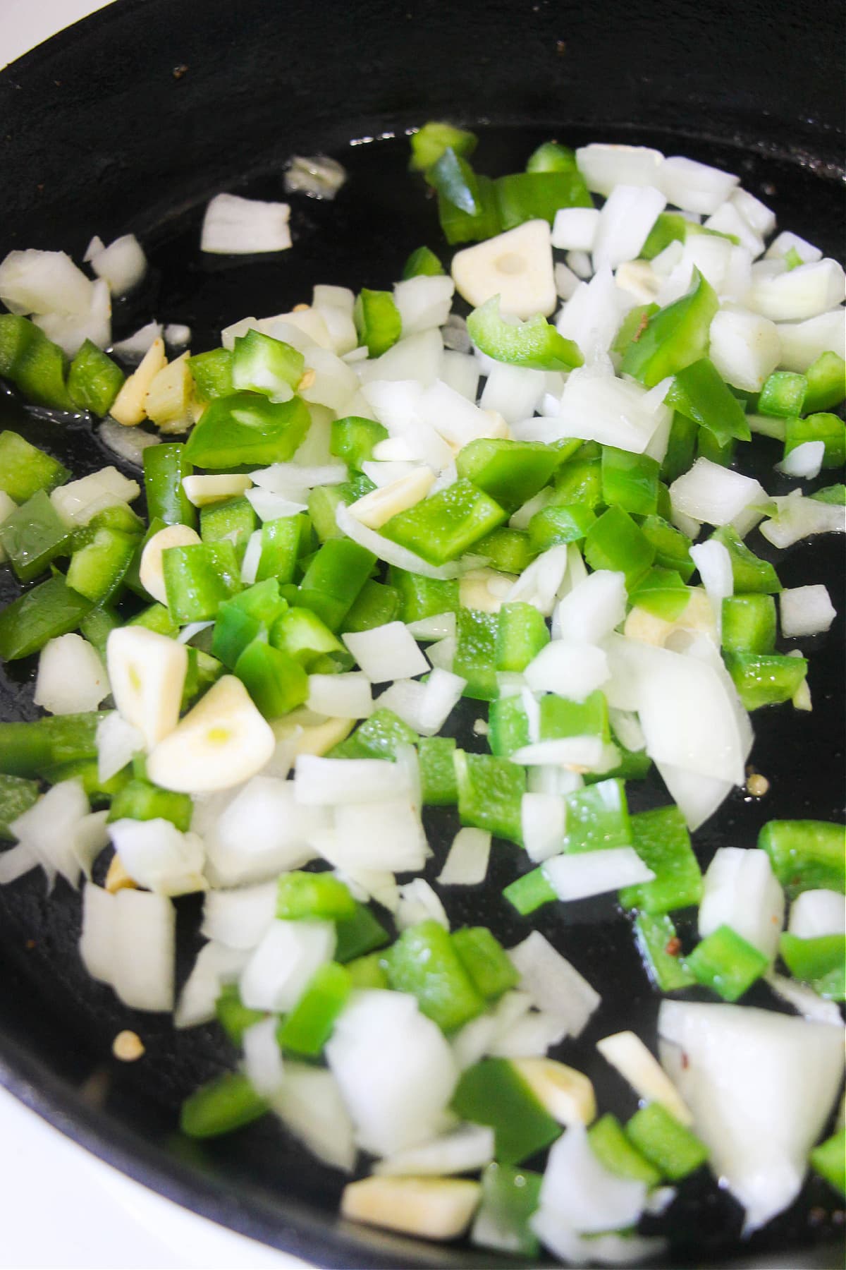 Chopped vegetables in skillet