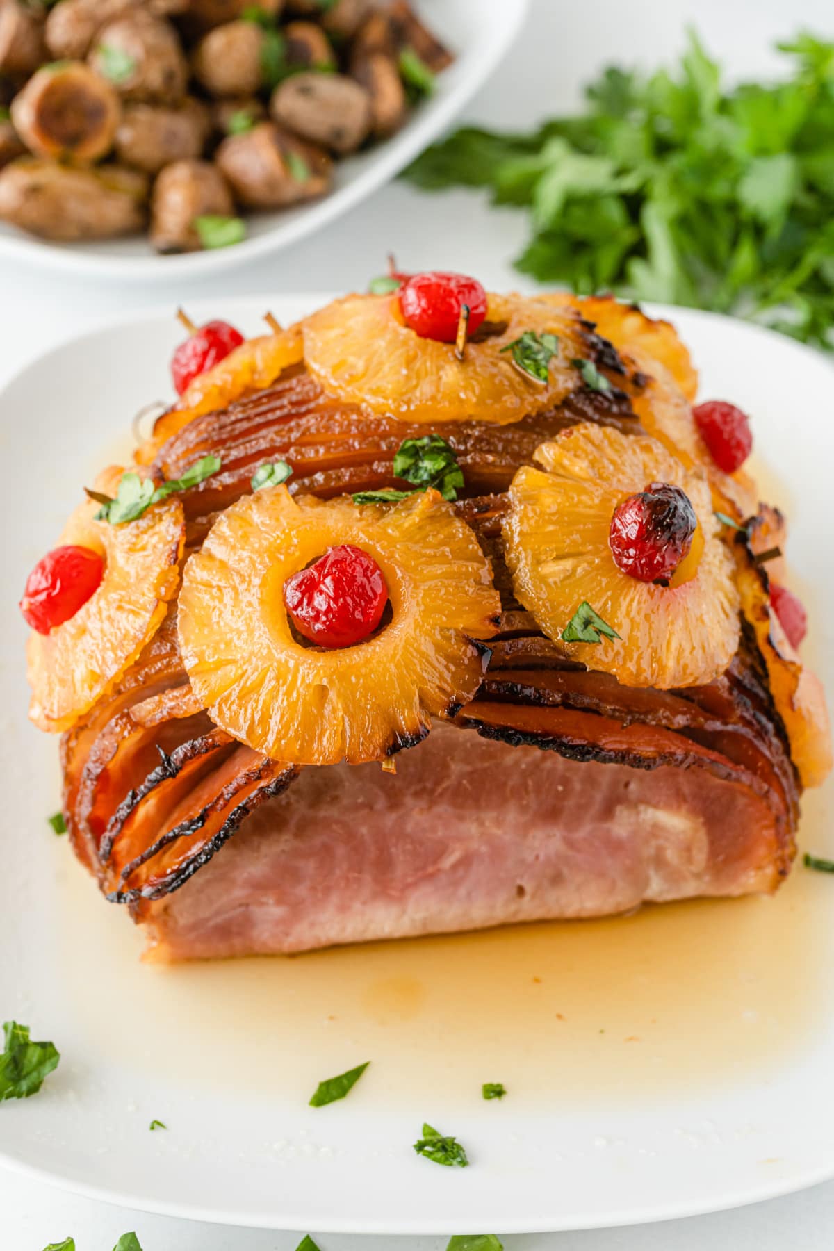 Pineapple Honey Glazed Ham On White Plate