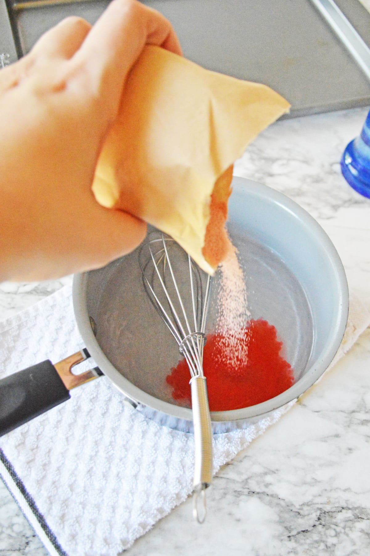 Pouring jello into water