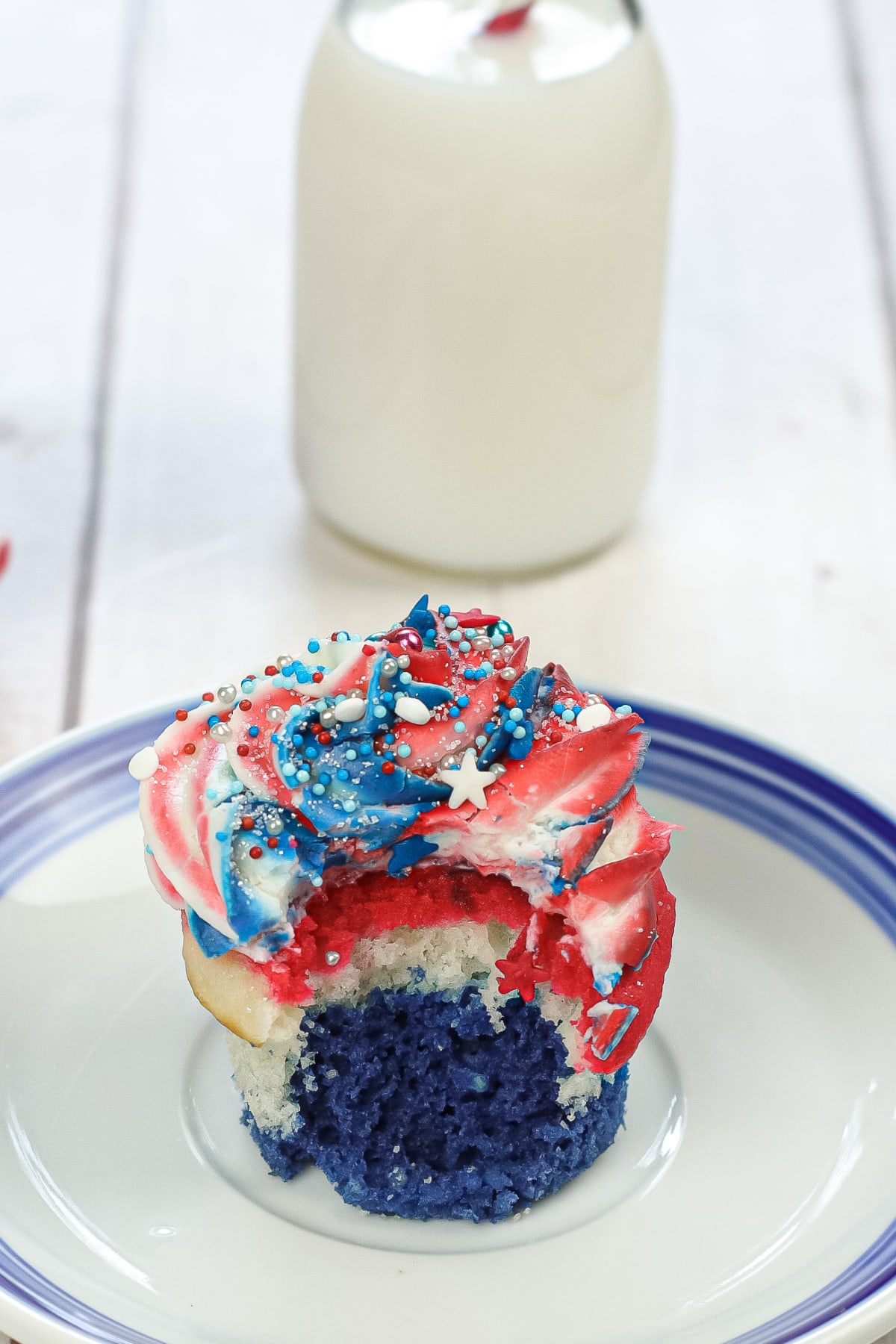 Red White and Blue Cupcake with a bite taken out
