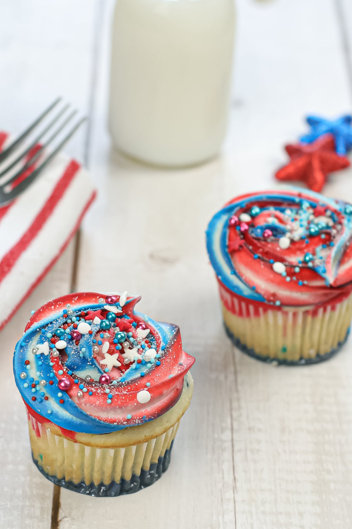 Red White and Blue Cupcakes on wooden board