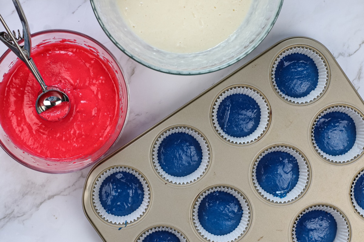 Blue cake batter in muffin tins