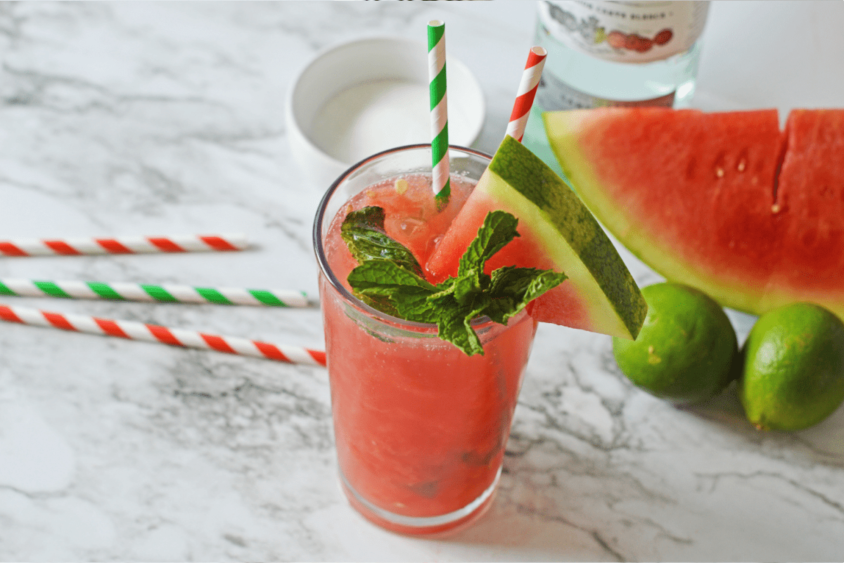 Watermelon mojito with garnish and colorful straws