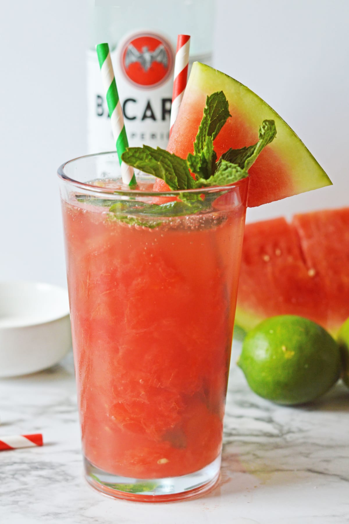 Watermelon mojito recipe with Bacardi bottle in background