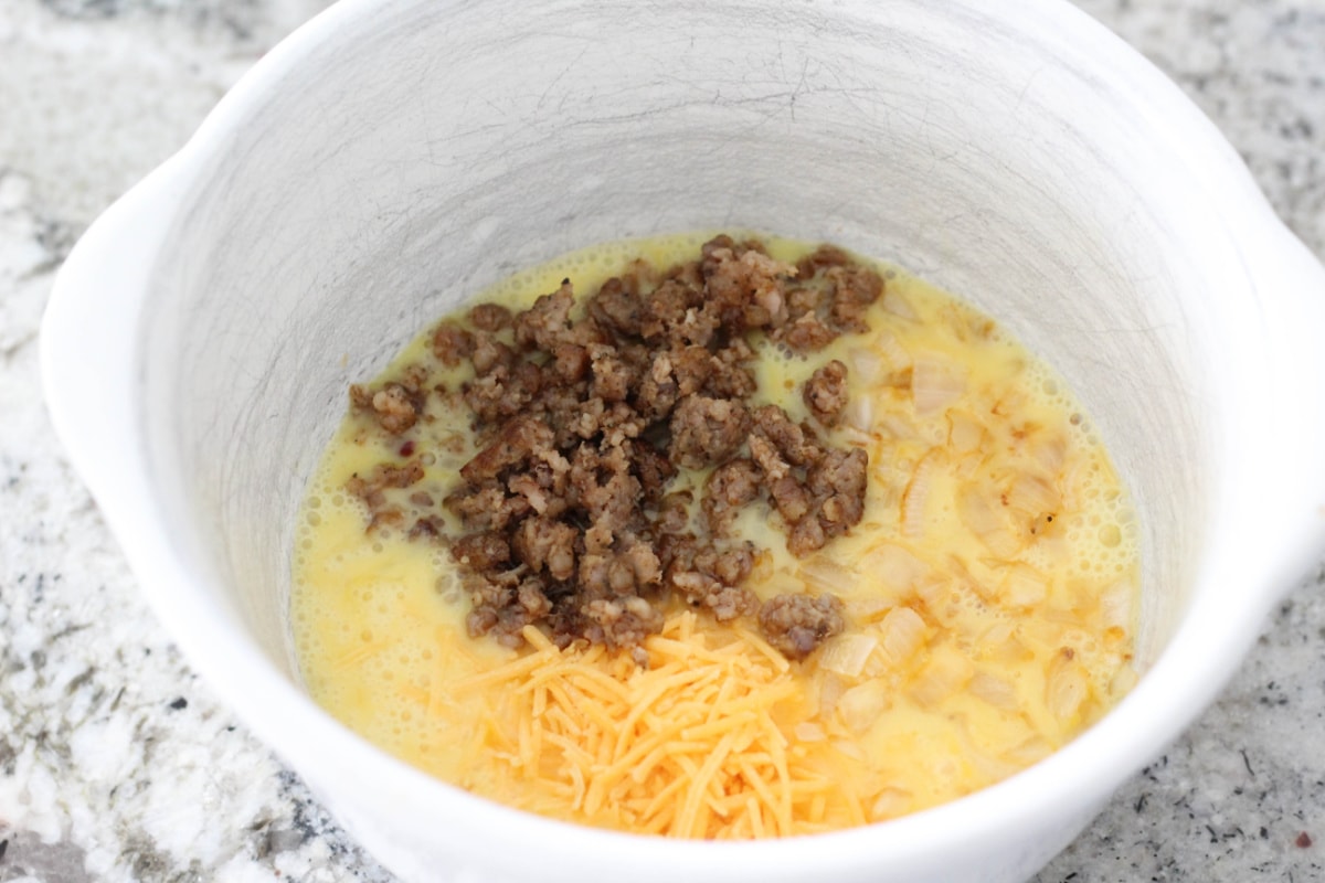 Sausage, cheese and other ingredients in bowl