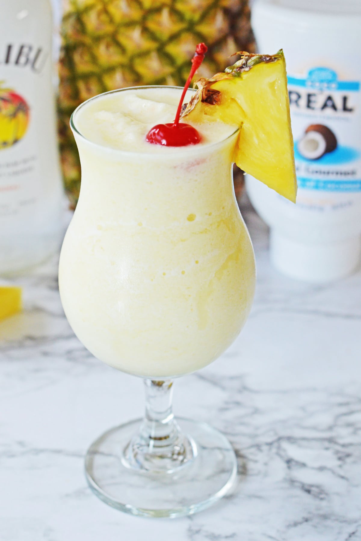 Pina Colada with cherry and pineapple