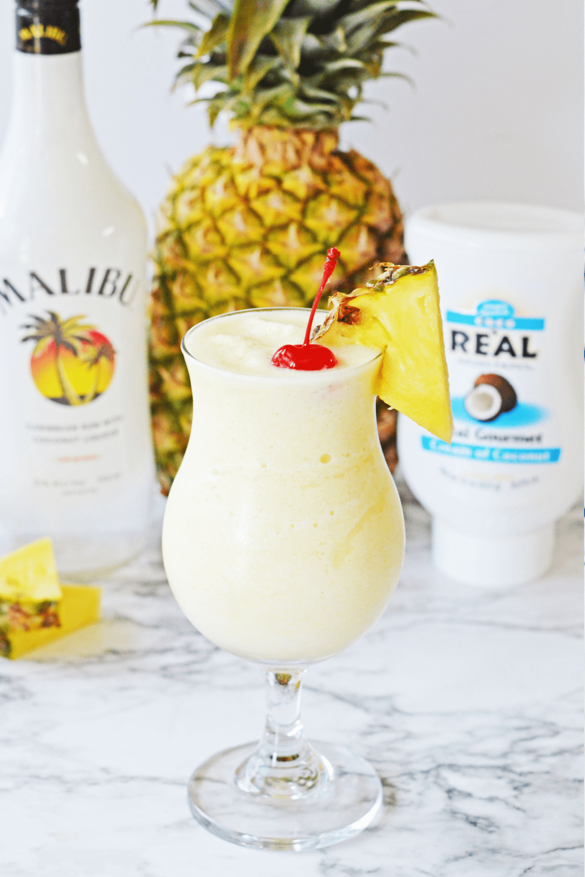 Pina Colada in front of pineapple