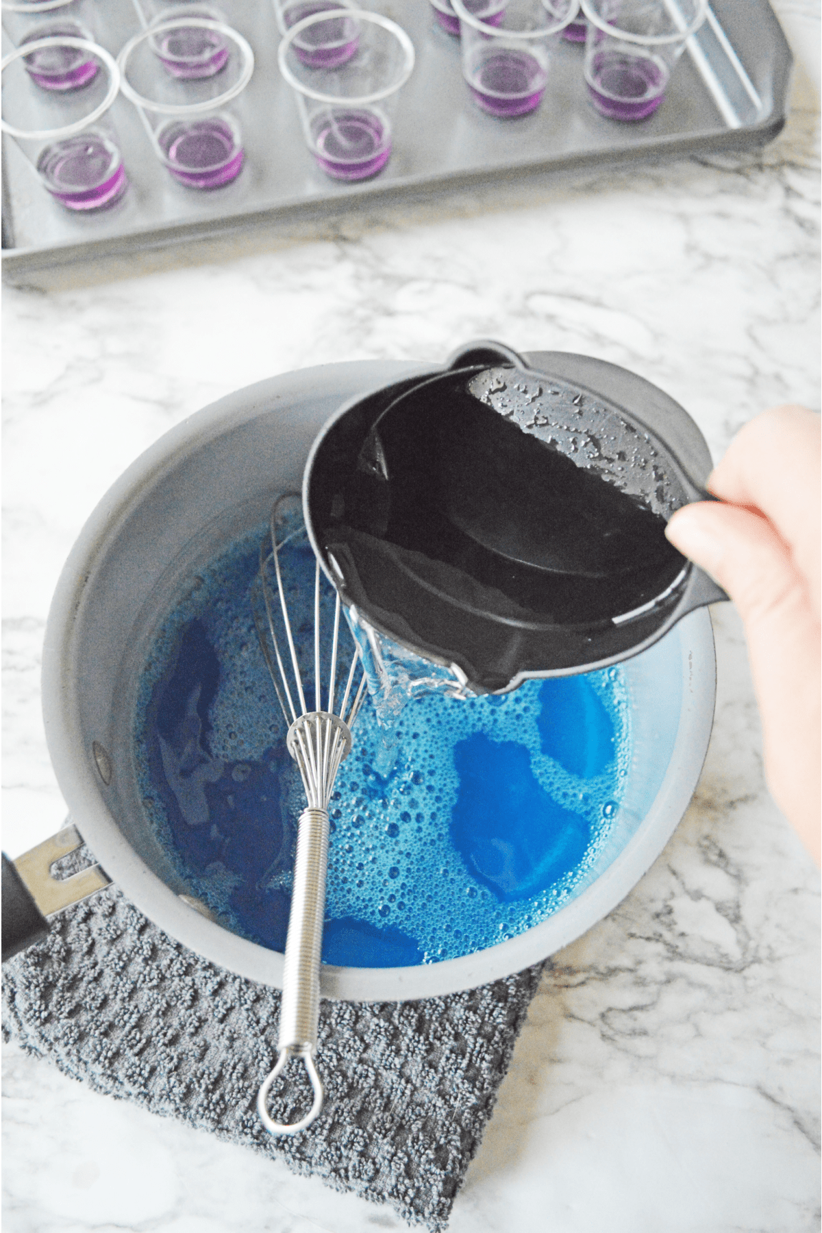 Adding more water to blue jello