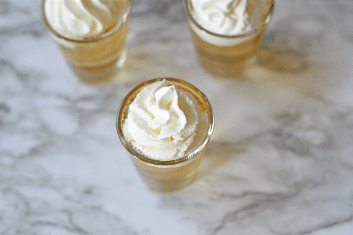 Whipped cream on butterbeer shots