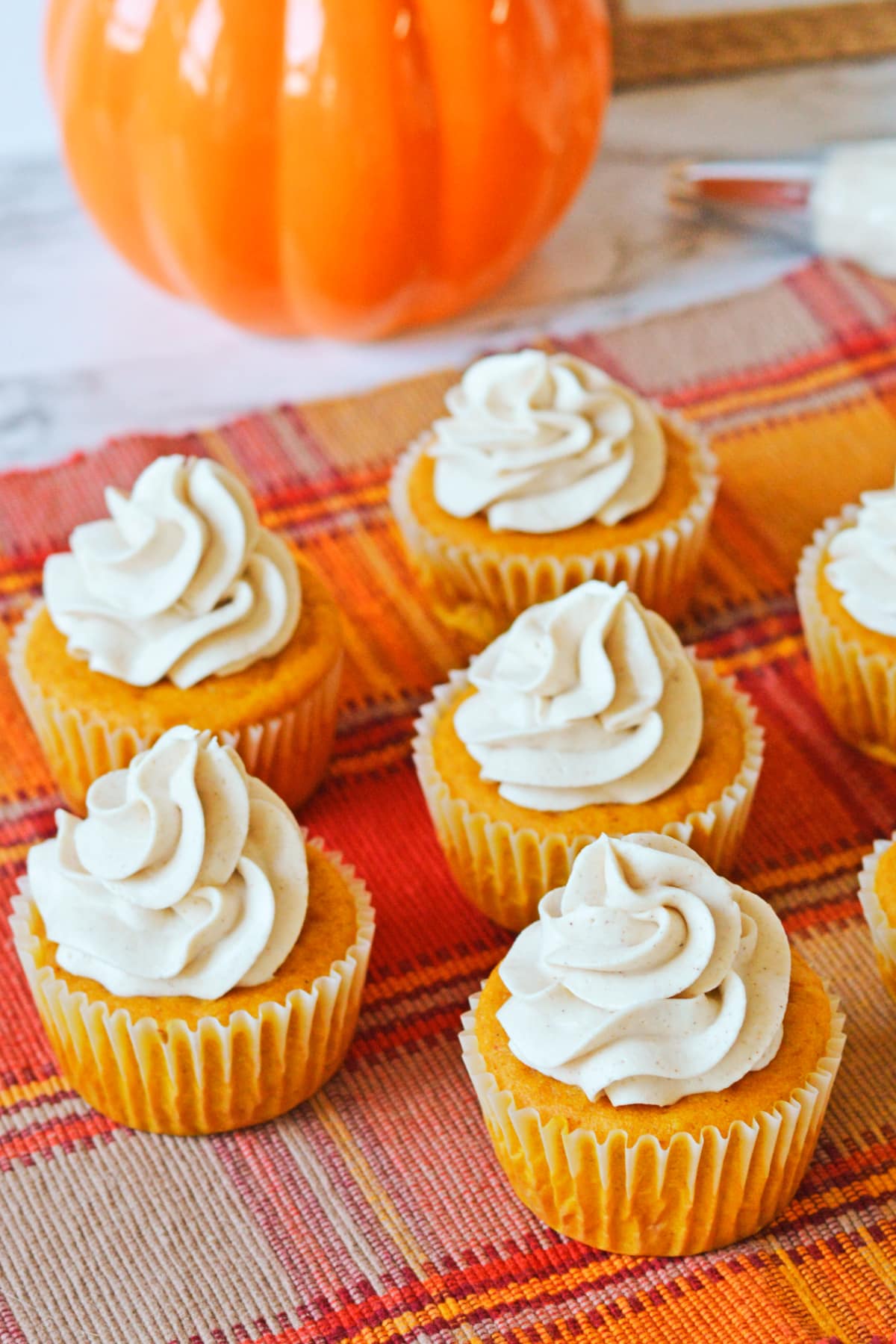 Pumpkin cupcakes with cream cheese icing