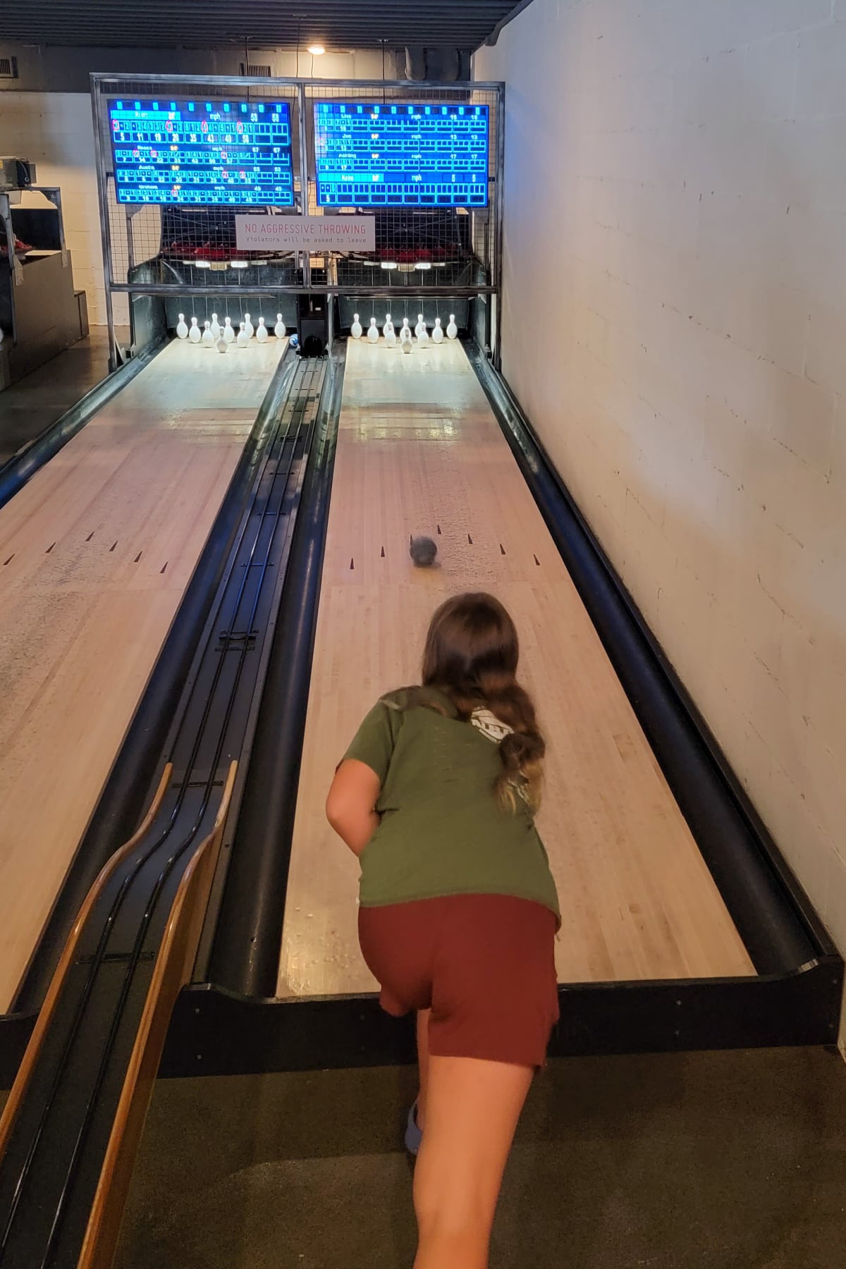 Child bowling at Duck Pinz
