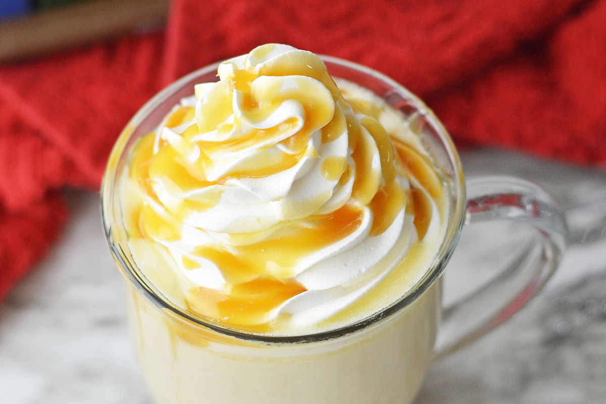 Butterscotch sauce and whipped cream topping butterbeer drink