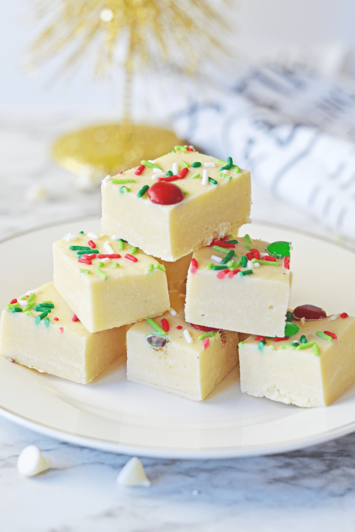Christmas cookie fudge stacked on plate