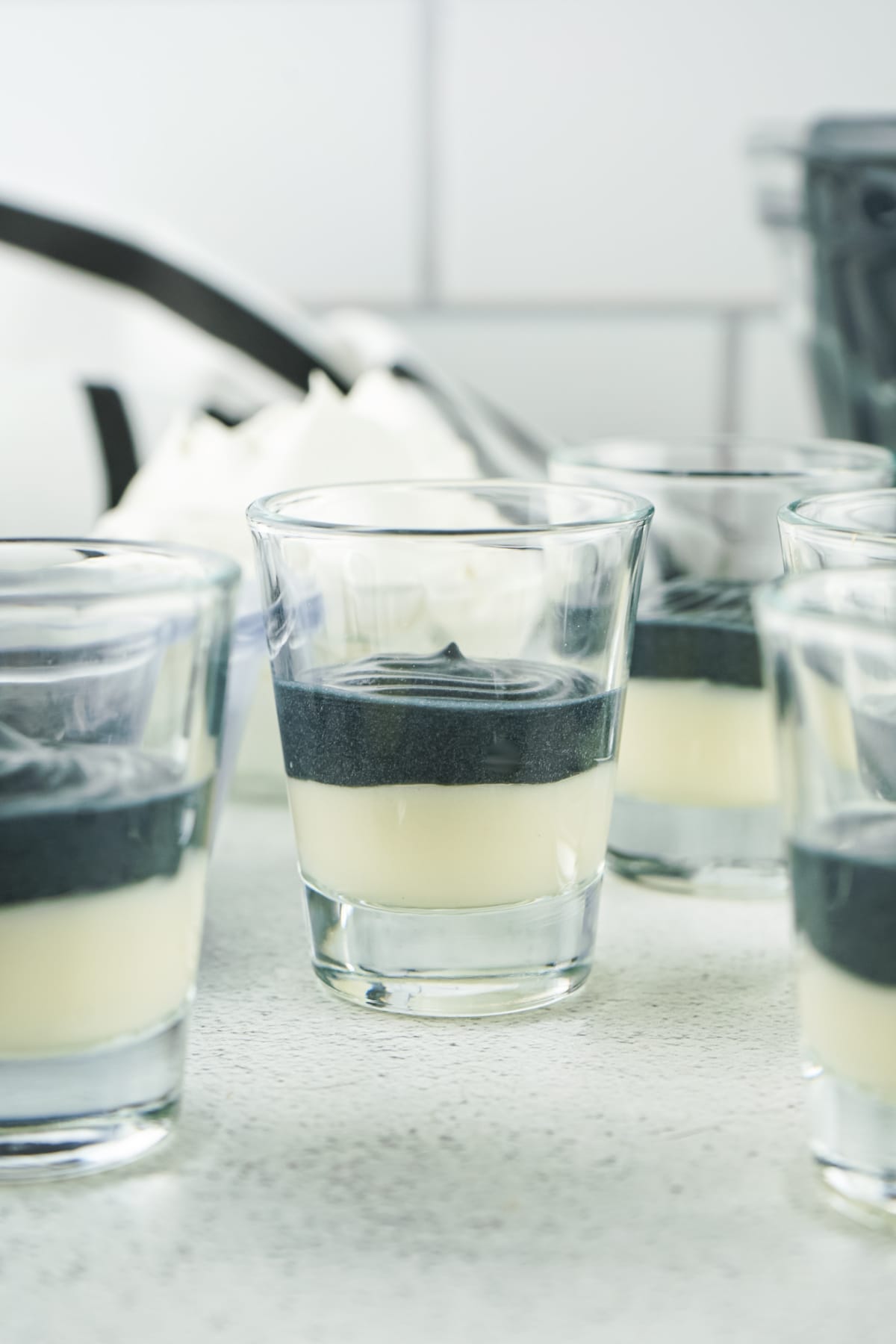 Black pudding layer in shot glasses