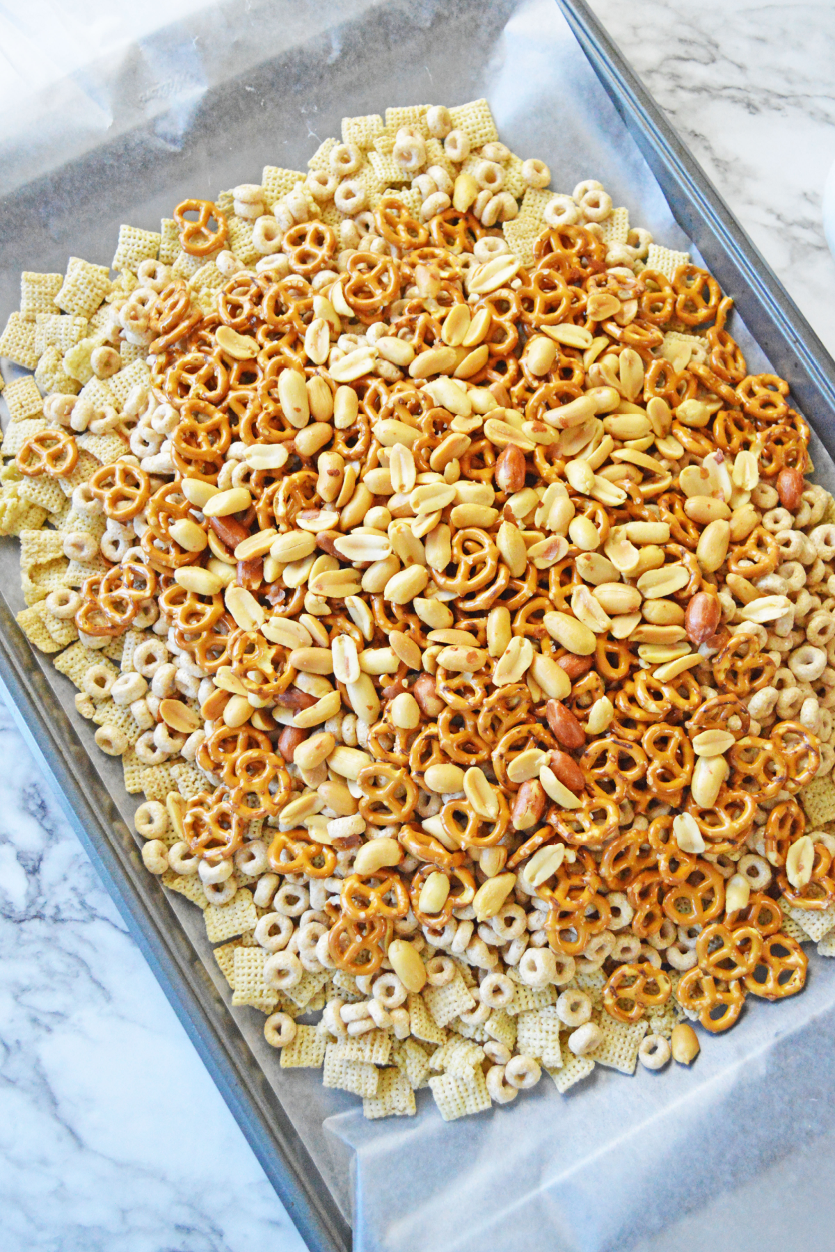 Snack mix on cookie sheet