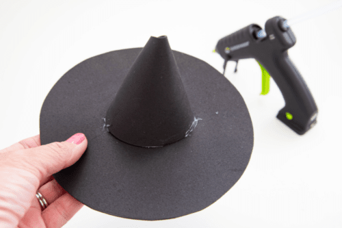 Craft foam cone glued to top of hat