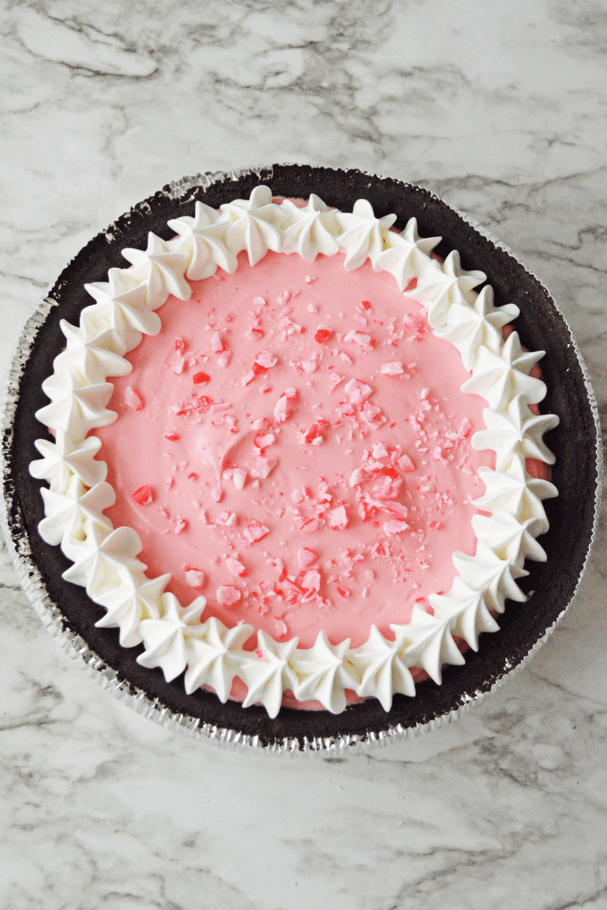Whipped cream on no bake peppermint pie