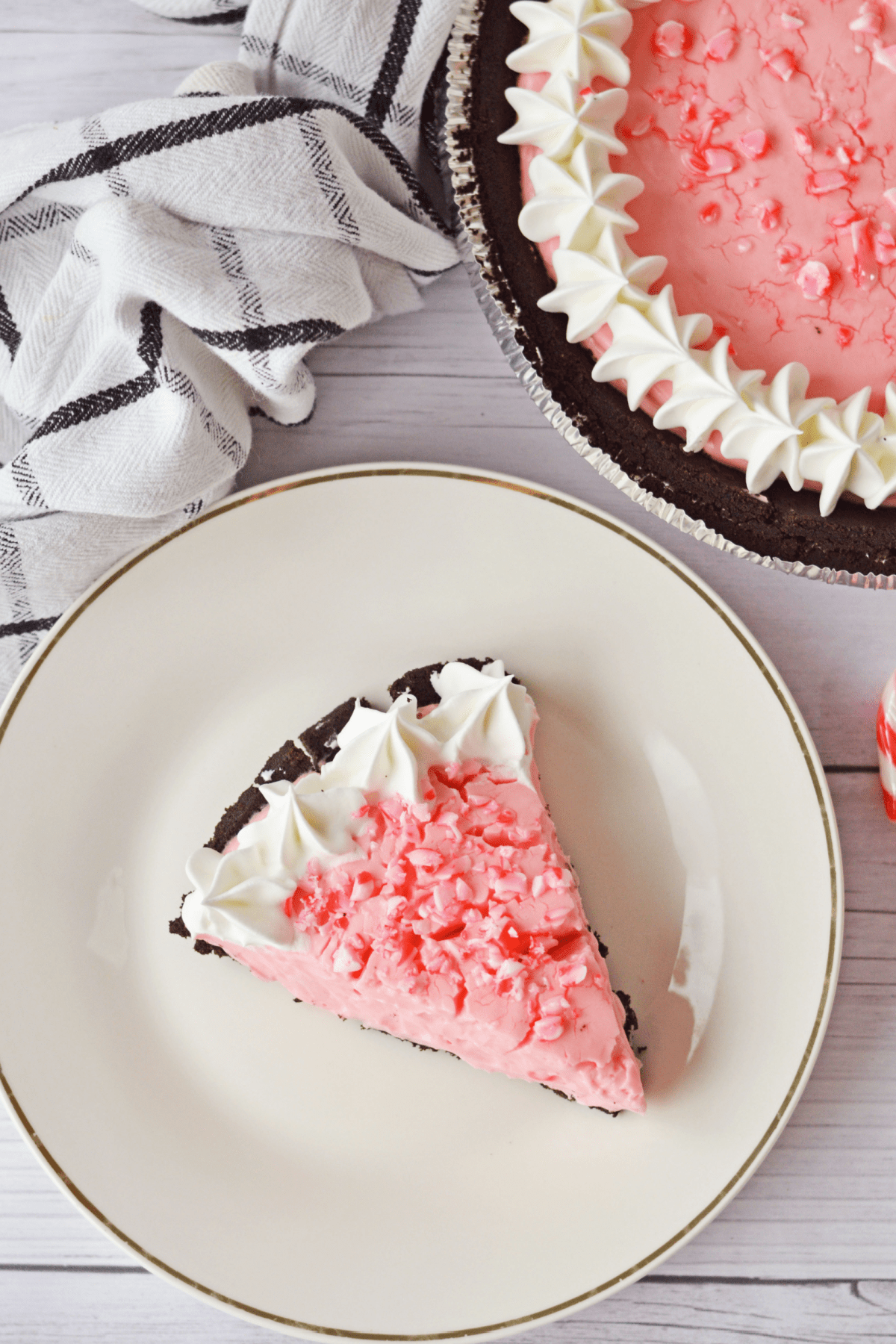 Slice of no bake peppermint pie on plate