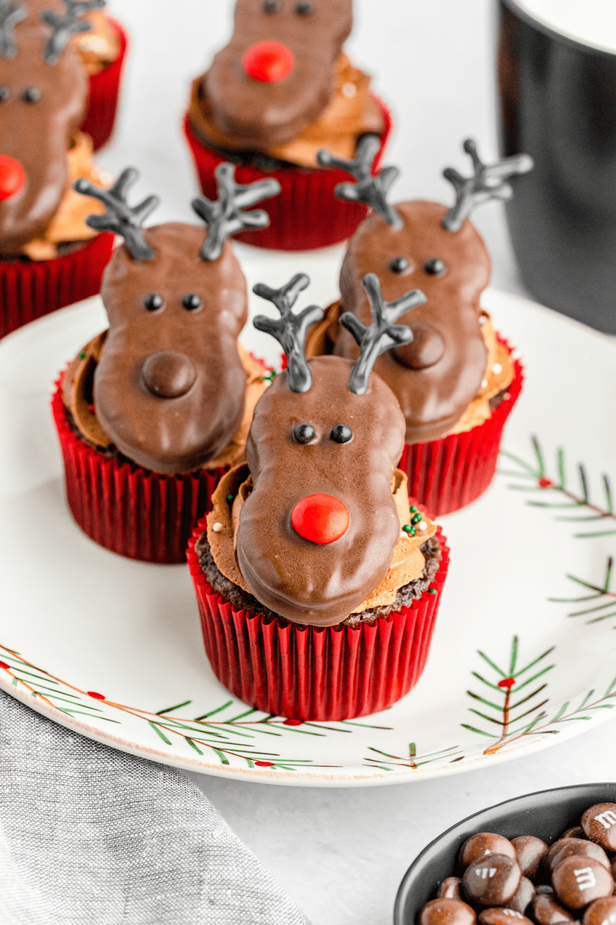 Nutter Butter Reindeer Cupcakes on holiday plate