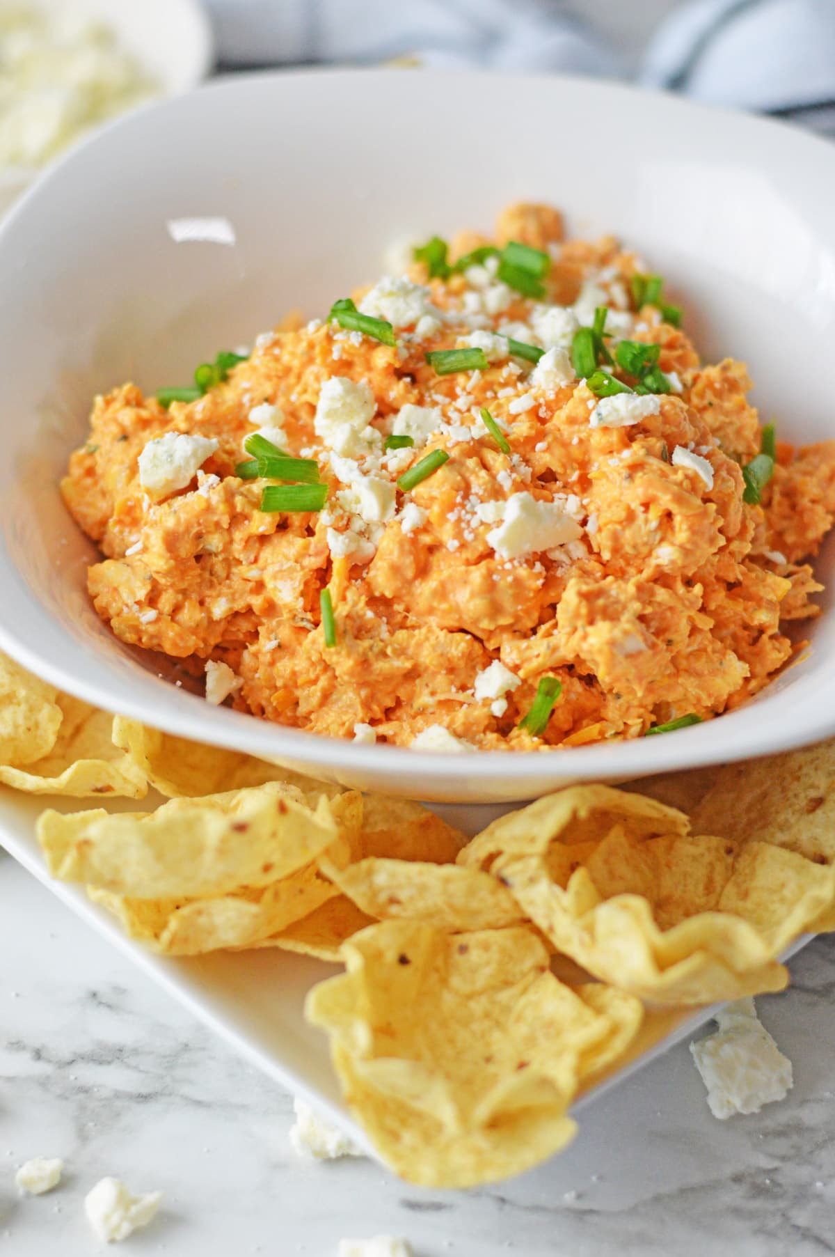 Cold buffalo chicken dip in white bowl