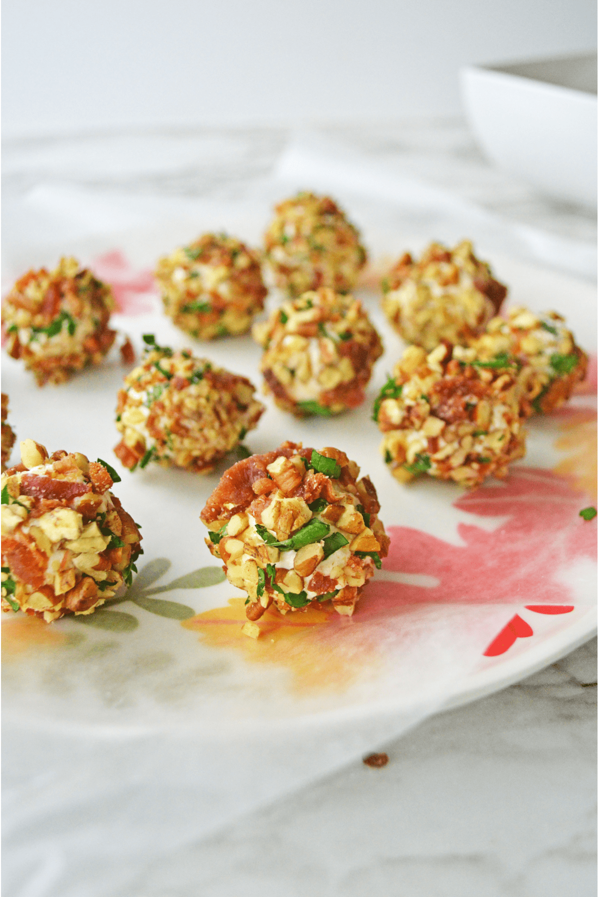 Mini cheese balls in plate with parchment paper