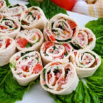 Pinwheel appetizers on romaine lettuce