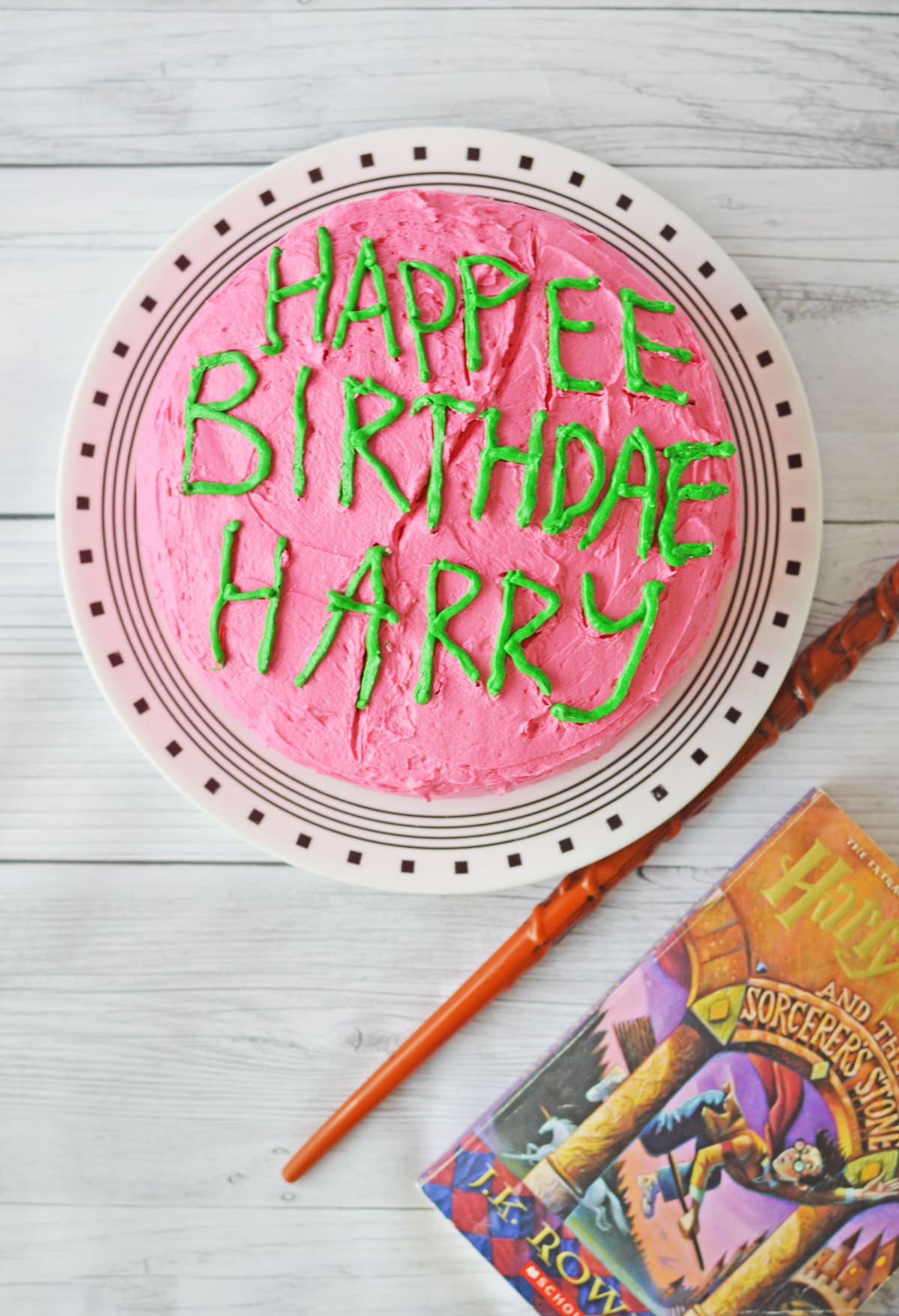 Harry Potter birthday cake with wand and book