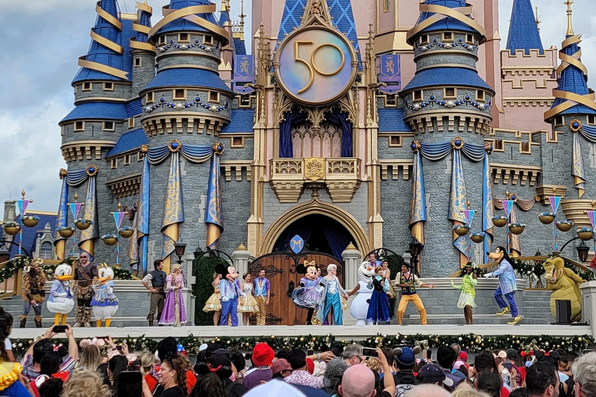 Characters on stage at Magic Kingdom