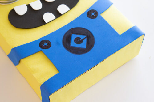 Blue craft foam overalls glued to Minion valentine box