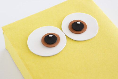 Minion eyes glued to yellow box