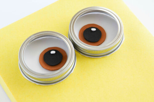 Minion eyes with mason jar lids as glasses