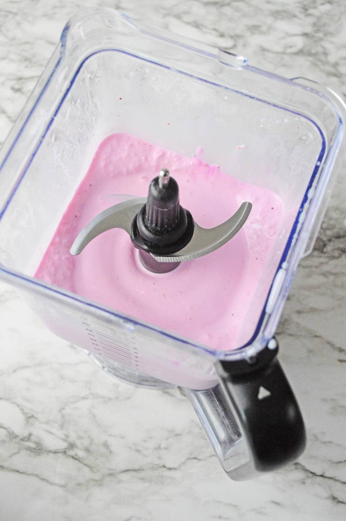 Pink milkshake in blender