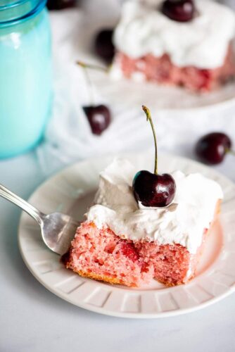 Cherry cake on white plate