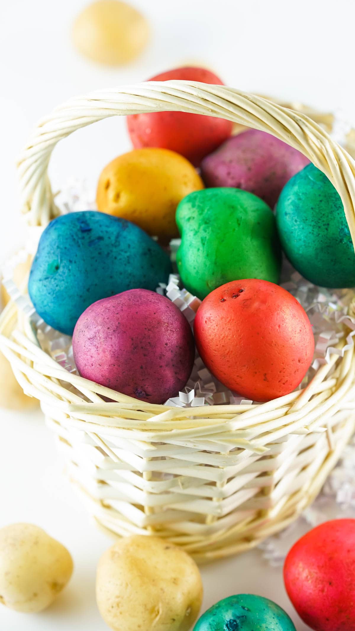 Dyed potatoes in basket