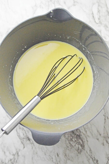 Instant pudding with whisk in mixing bowl