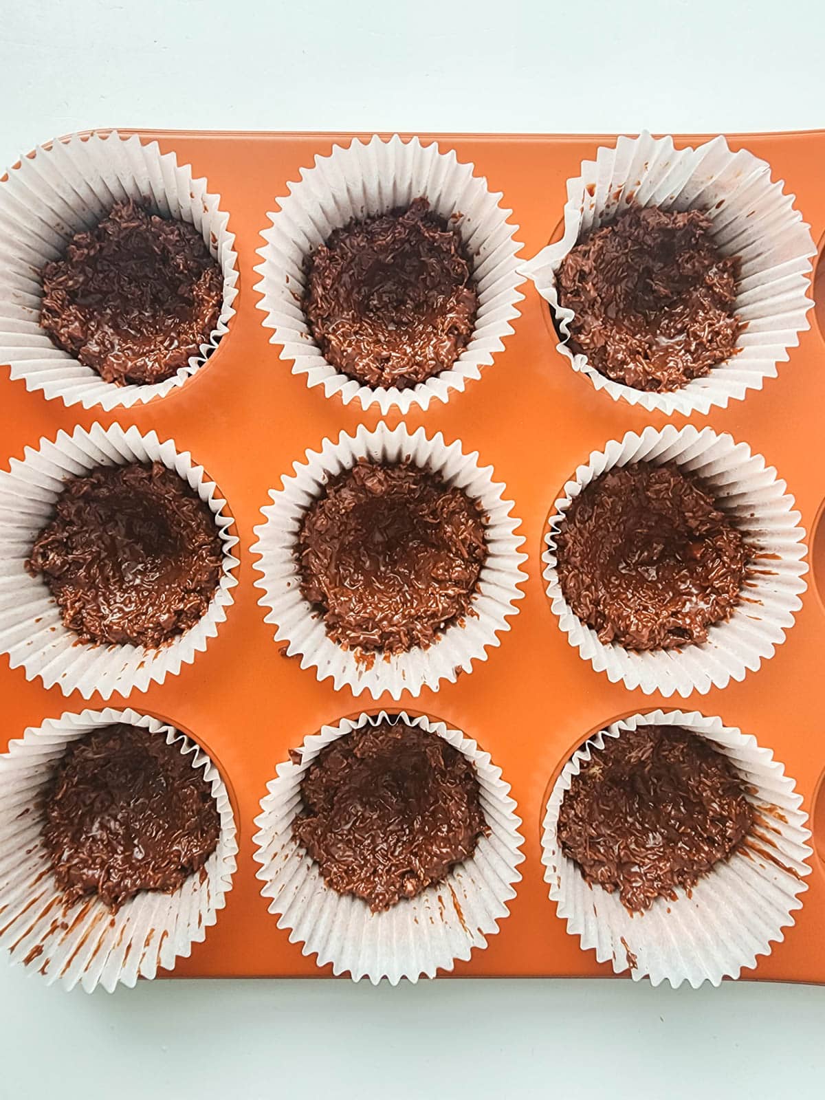 Chocolate "nests" in cupcake wrappers in muffin tin