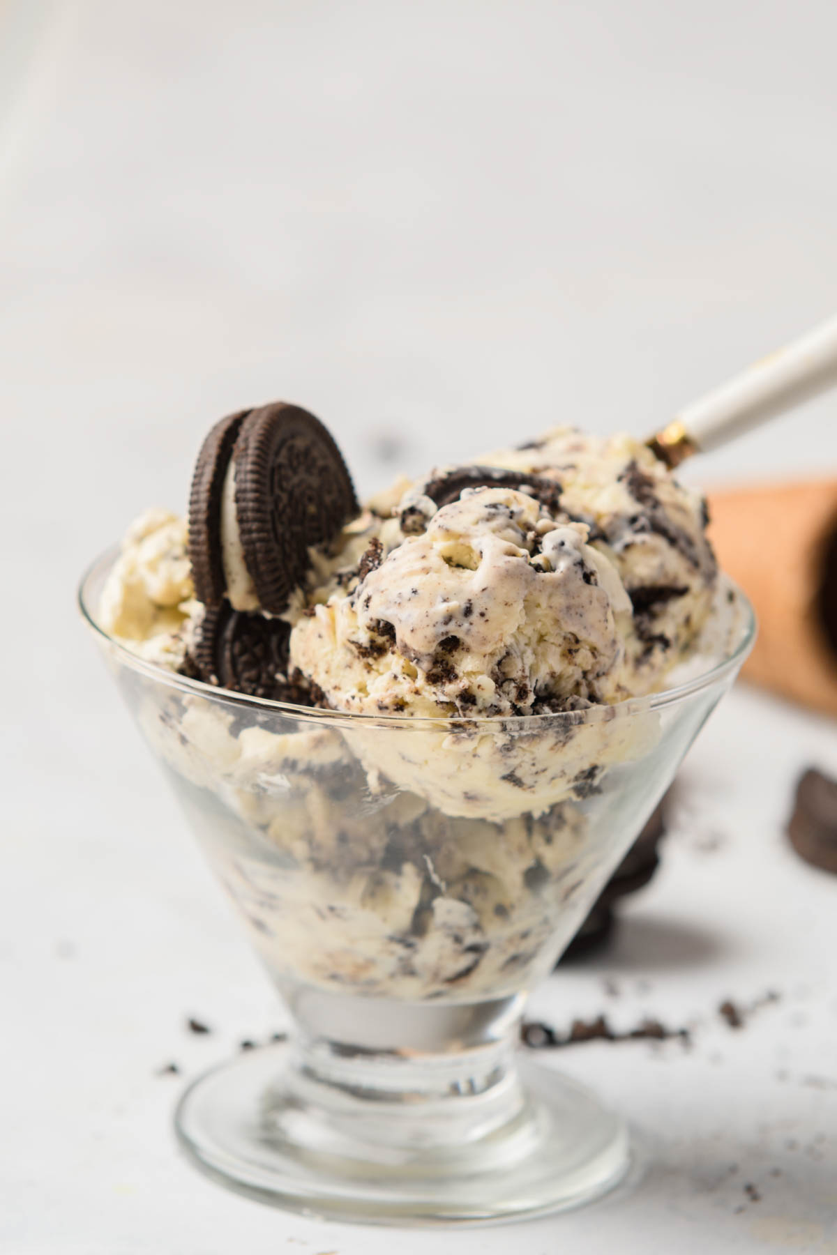 Small glass filled with Oreo ice cream