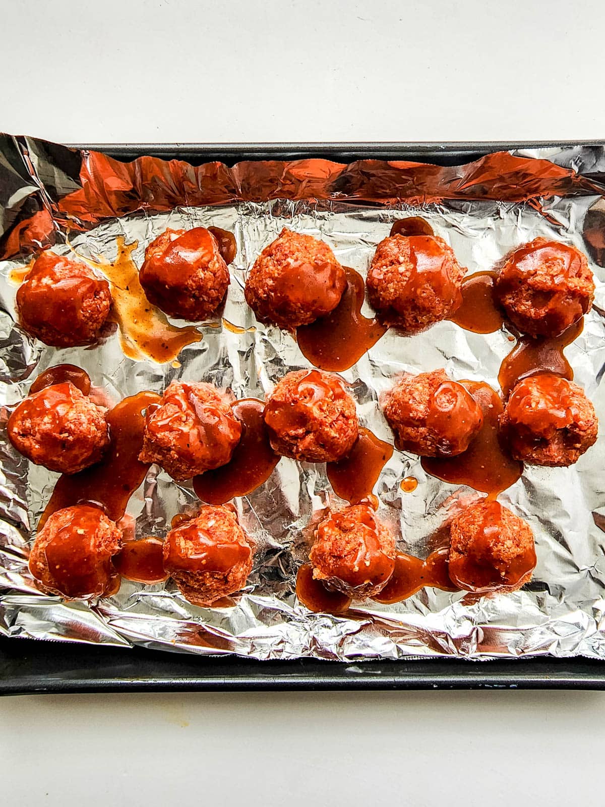 Meatballs covered with sauce