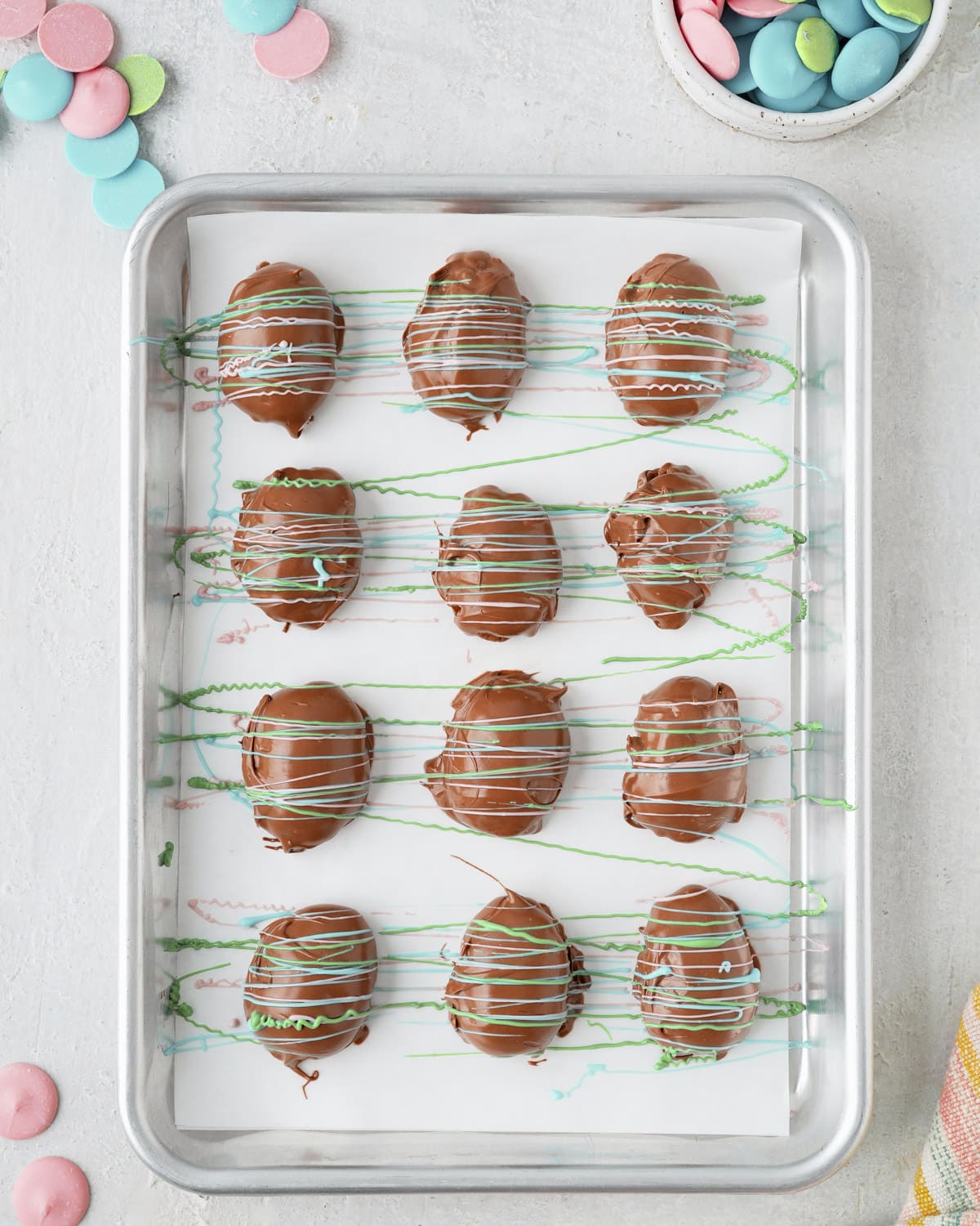 Chocolate eggs drizzled with candy melts