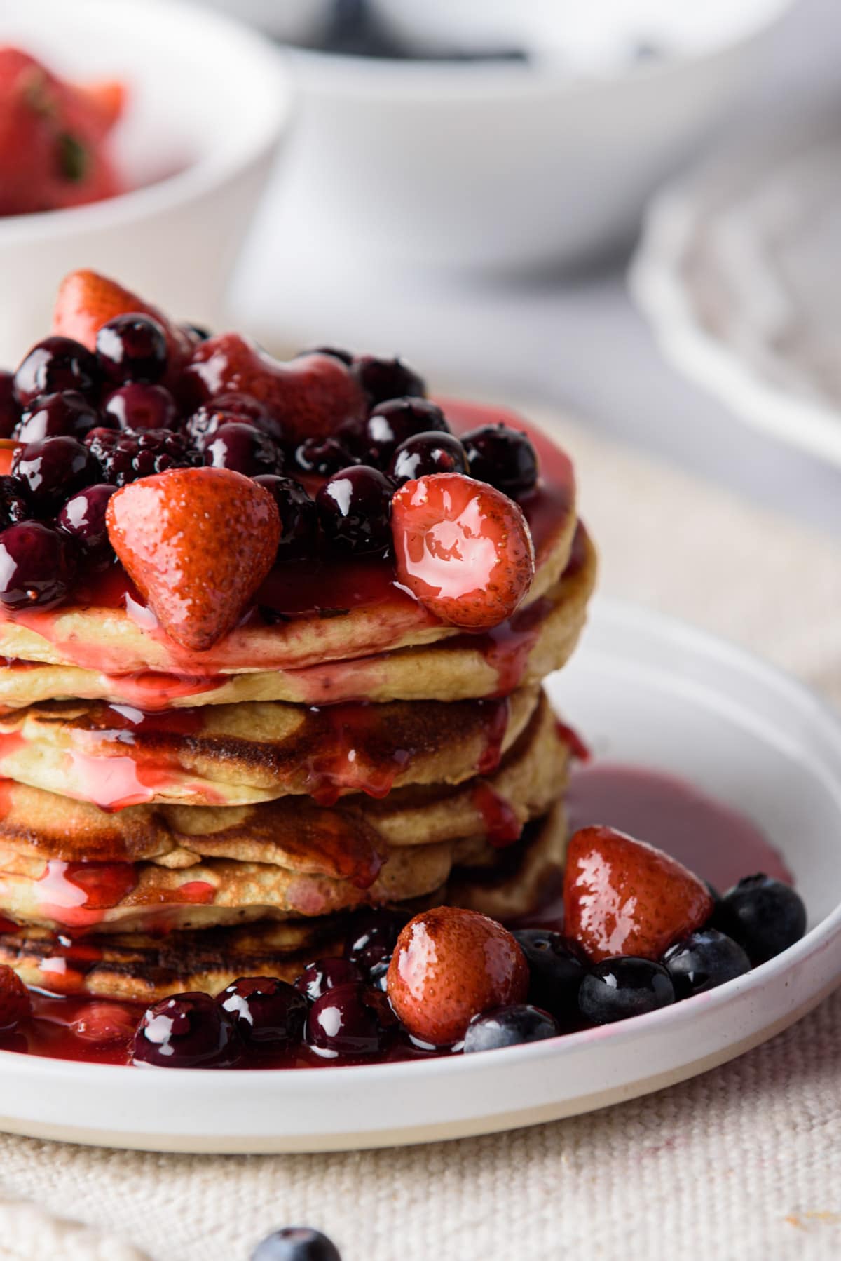 Pancakes topped with berry syrup