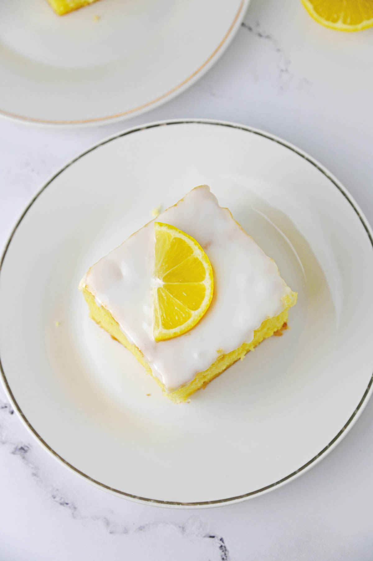 Lemon Jello Cake on white plate