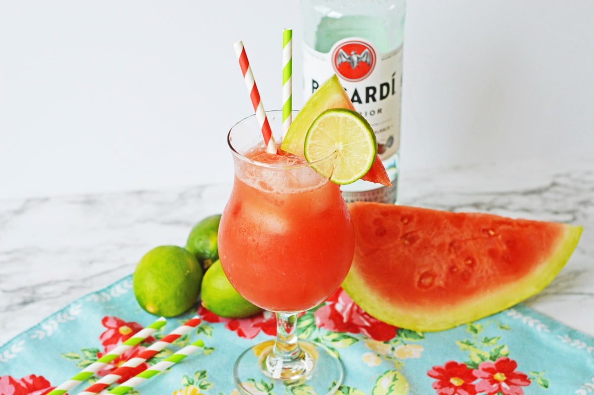 Watermelon rum punch on colorful flowered napkin