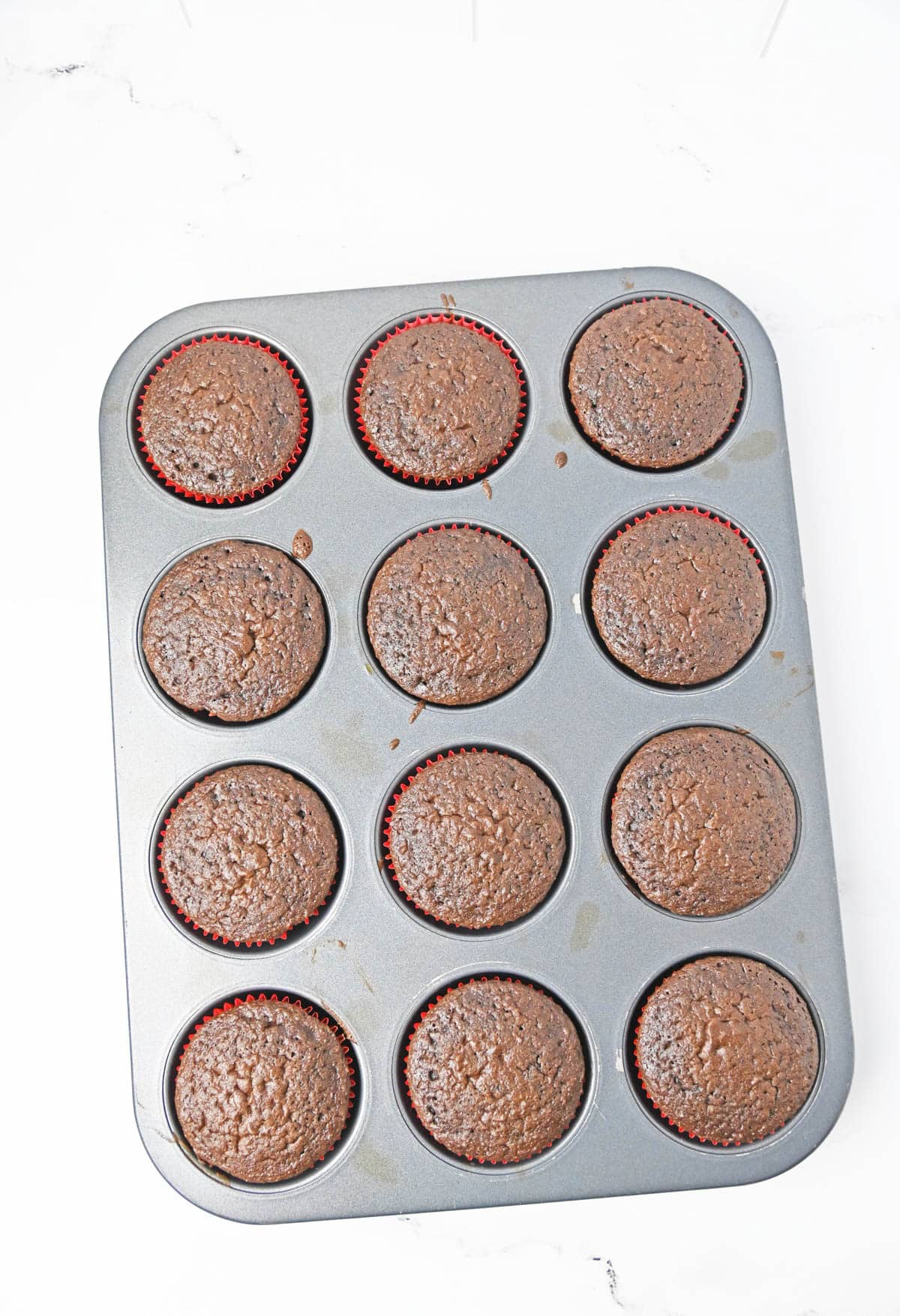 Chocolate cupcakes in cupcake tin