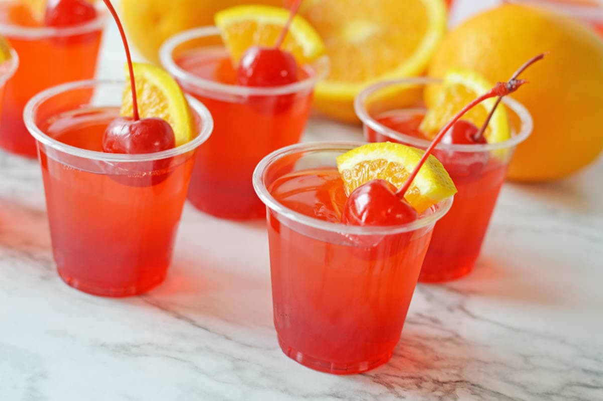 Jello shots with cherry and orange