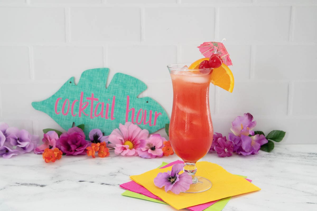 Bacardi rum punch with cocktail hour sign and flowers