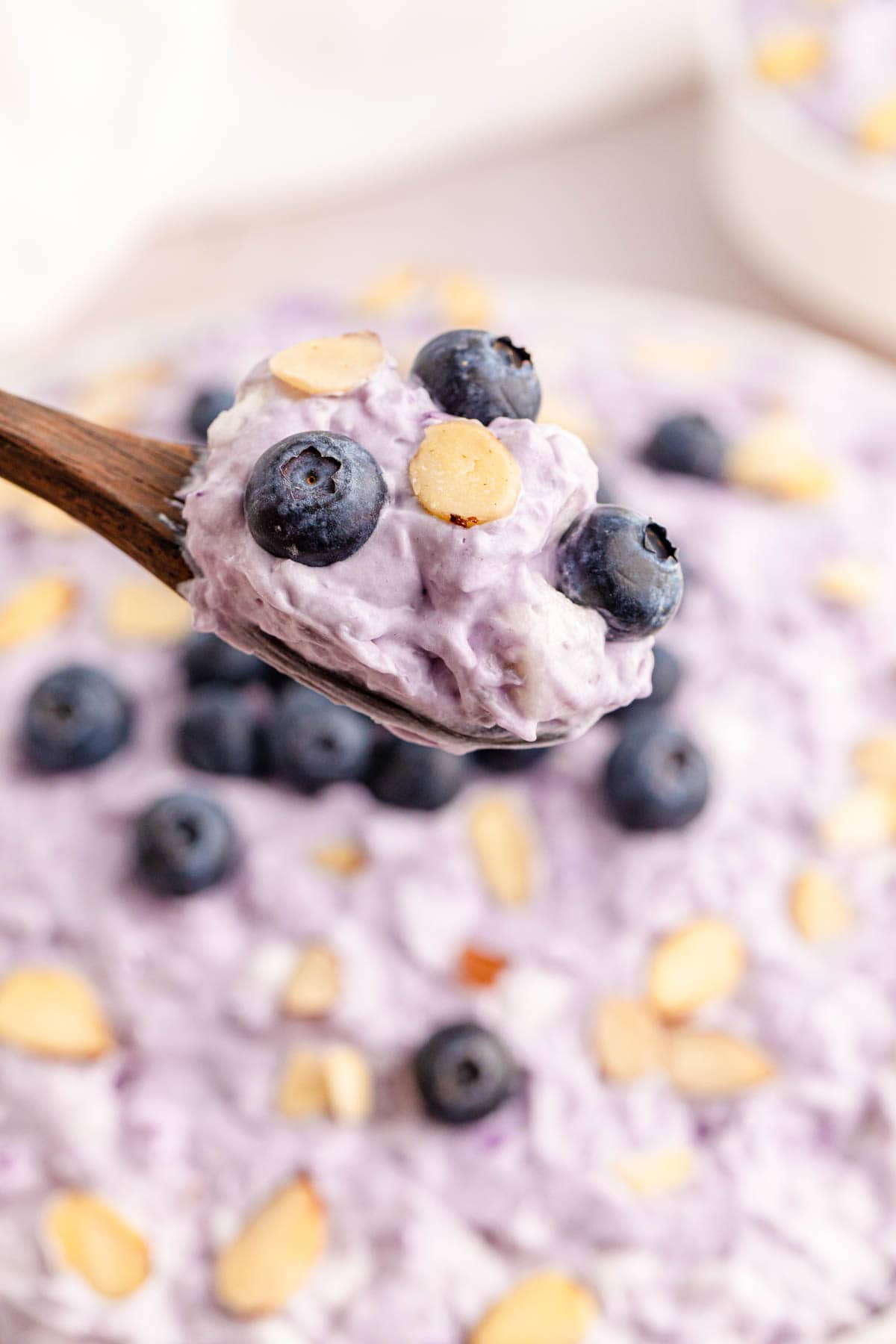 Blueberry fluff on wooden spoon
